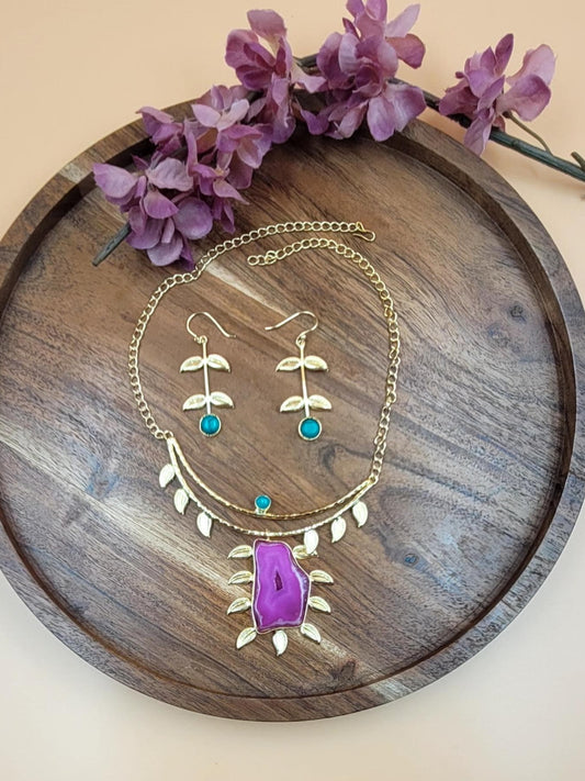 Leaf Designed Hasli Style Handmade Golden Brass Necklace Set with Raw Magenta Stone