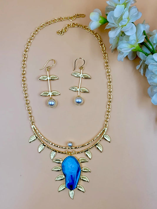 Leaf Designed Hasli Style Handmade Golden Brass Necklace Set with Raw Blue Stone