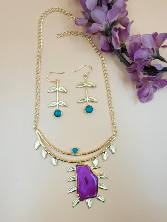 Leaf Designed Hasli Style Handmade Golden Brass Necklace Set with Raw Magenta Stone