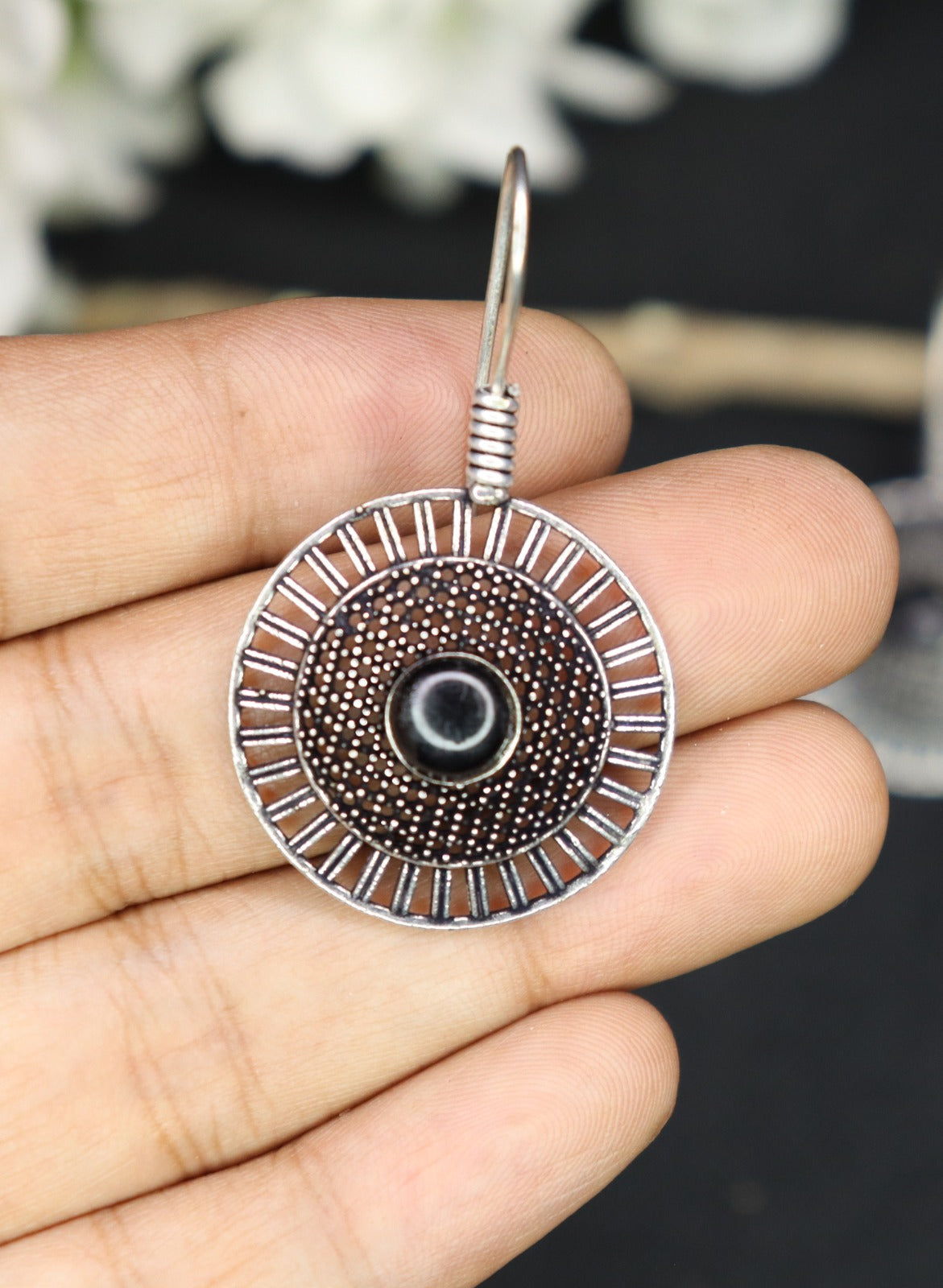 Silver wheel earring